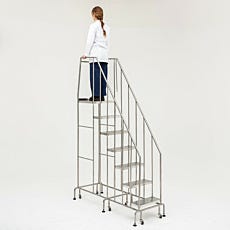Round tube mobile step ladder standing on step