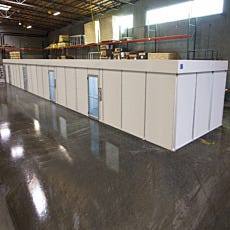Fire-resistant cleanroom shown with FM 4910-listed transparent CPVC wall panels