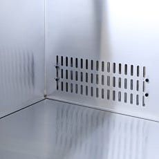 Interior of recirculating clean bench with adjustable rear plenum to recirculate air