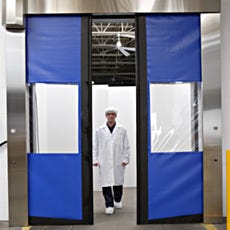view of rite-hite split door with man walking out
