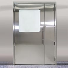 Custom BioSafe CleanSeam cleanroom stainless steel door with partial view window, inactive leaf and a ladder pull handle