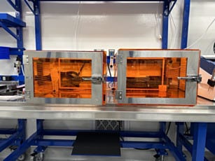 A pair of Terra’s amber acrylic desiccators for storing moisture-sensitive materials