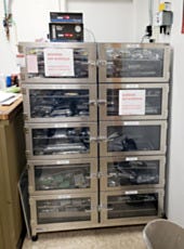 A large desiccator cabinet used to store electronics in antistatic bags