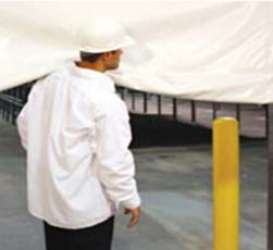 worker lifting up the roll up door