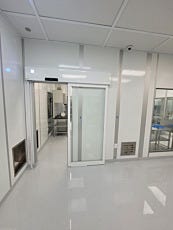 Automatic aluminum sliding glass door in sterile usp pharmacy compounding cleanroom