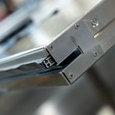 Close-up of automatic sliding door edge seal and frame profile