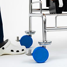 close up of blue polyurethane casters on a round tube cleanroom cart