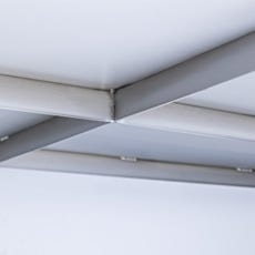 closeup underside view of stainless steel workstation