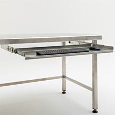 close up of keyboard tray attached to worksation