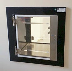 Acrylic valuline pass-through box installed in a cleanroom wall