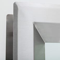 Stainless steel continuous-welded seam on center-mount cleanroom window corner