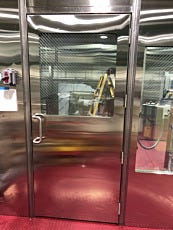 Stainless steel cleanroom door with fire-rated window for an explosion proof cleanroom