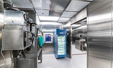 Hazardous cleanroom with isolator, refrigerator, pass-through, and sink station