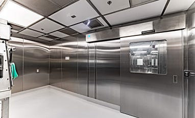 Stainless steel pharmaceutical cleanroom with automated sliding door and viewing window