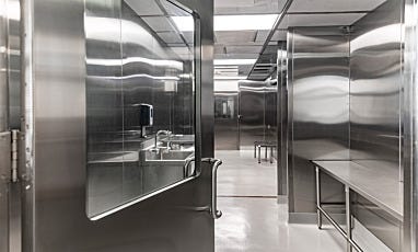 Cleanroom entry with stainless steel sink and work table