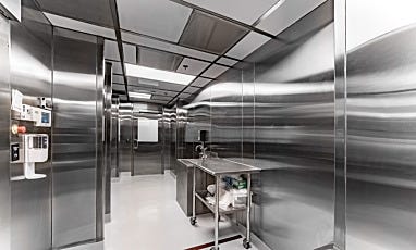 Cleanroom with stainless steel sink and supply cart