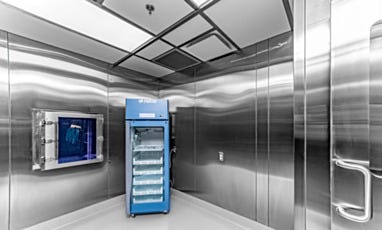 Cleanroom storage area with pass-through chamber and refrigerator
