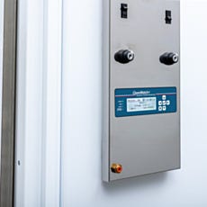 Cleanroom control panel mounted to the wall of a Terra hardwall modular cleanroom