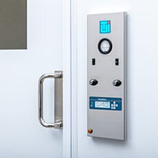 Cleanroom control panel mounted to the wall of a Terra hardwall modular cleanroom
