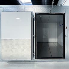 close-up view of custom cold room with left-hand-swing door