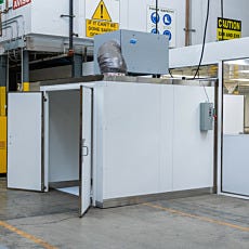 Photo of drying room taken from the side with both doors open