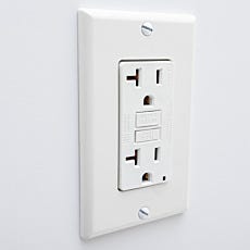 white plastic duplex power outlet
