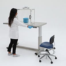 Acrylic vacuum chamber on top of electric height adjusting table
