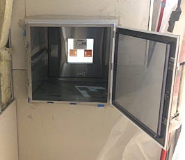 Fire rated transfer hatch for COVID-19 sample handling