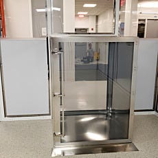 Floor-mounted pass-through for carts carrying medical devices