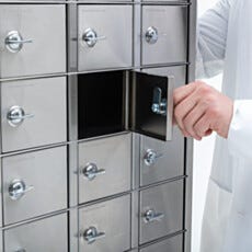 Freestanding 304 or 316 stainless steel high capacity phone storage locker for cleanroom gowning room applications