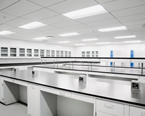 Photograph of customized laboratory casework in white powder-coated steel