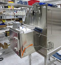 Glovebox with inert gas airlock for manufacturing specialty silicones