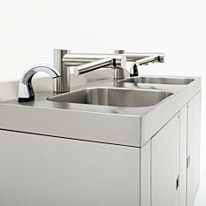 close up of dual automatic stainless steel sinks