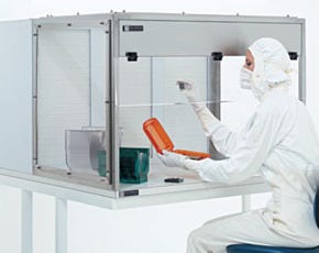 Draws exhaust fumes into an exhaust duct for delivery to an in-house filtration system