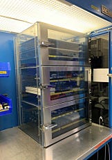 Three chambered left-handled desiccator with shelf racks and chrome LiftLatches