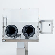 Isolator glovebox with dual glove ports on height adjustable ergonomic cleanroom stand