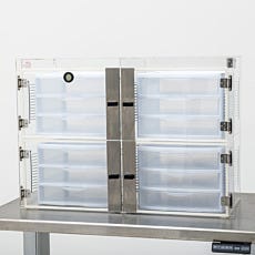Four large drawers inside a four-chamber desiccator