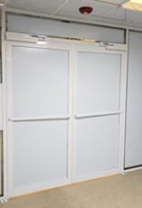 Aluminum manual double swing doors for a data center server room