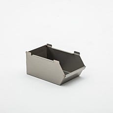Photo of a small solid stainless steel bin for holding assembly parts