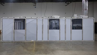 Modular cleanroom exterior showing wall panels and entry doors