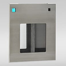 The flush-mount side of a stainless steel pass-through chamber using a transparent sliding door