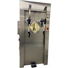 nuclear hot cell with telemanipulator arms, leaded glass, lead-lined interior, and access doors
