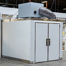 Image of humidity-controlled drying room from outside of a cleanroom