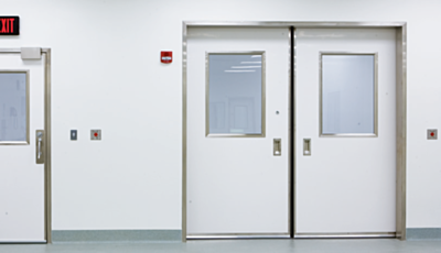 Paired swinging fiberglass door in a real setting