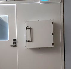 Flame retardant polypropylene pass-through chamber for a data server center