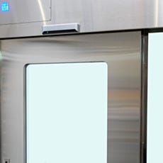 Touchless motion sensor mounted on the automatic sliding door for hands-free activation