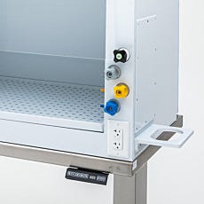 Zoomed in photo of colored knobs on a containment hood