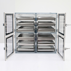 Semiconductor desiccator cabinet with faraday cage design and sliding trays