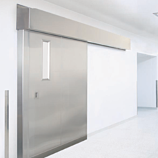 Single sliding cleanroom door with stainess steel panel and hardware in real setting