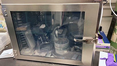 SmartDesiccator 304 stainless steel cabinet on cleanroom workbench